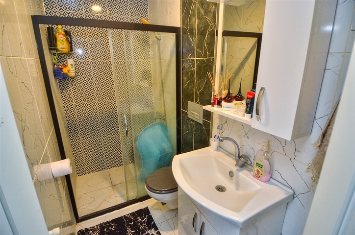 Квартира планировки 1+1 в микрорайоне Юксекалан - Анталия