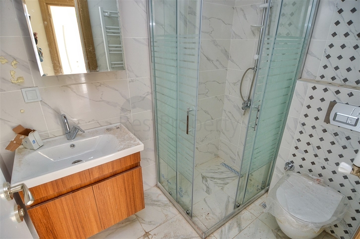 Квартира планировки 6+1 в центре города Анталии