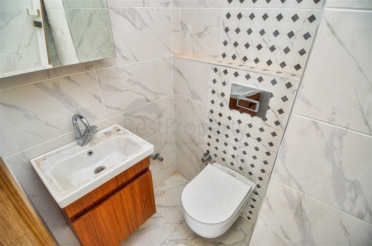 Квартира планировки 6+1 в центре города Анталии