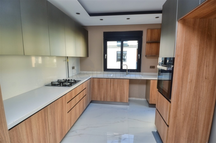 Квартиры планировки 4+1 в районе Коньяалты - Анталия 