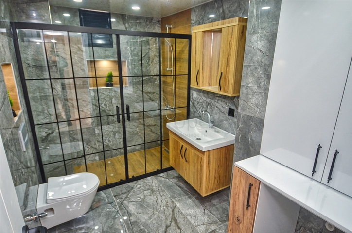 Квартира планировки 3+1 в микрорайоне Гувенлик - Анталия