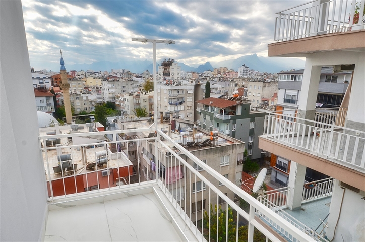 Квартира планировки 3+1 в микрорайоне Гувенлик - Анталия