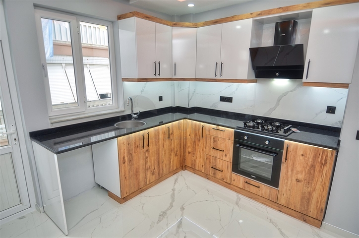 Квартира планировки 3+1 в микрорайоне Гувенлик - Анталия