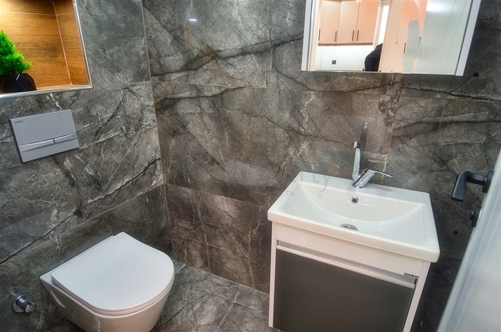 Квартира планировки 3+1 в микрорайоне Гувенлик - Анталия