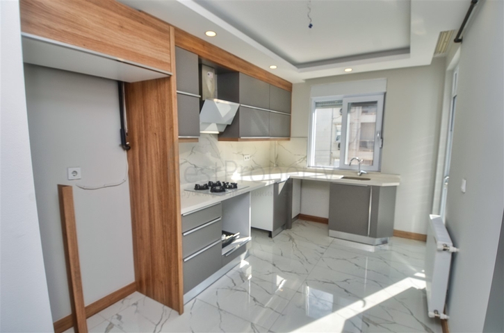 Квартира планировки 2+1  в микрорайоне Кызыларык - Анталия  