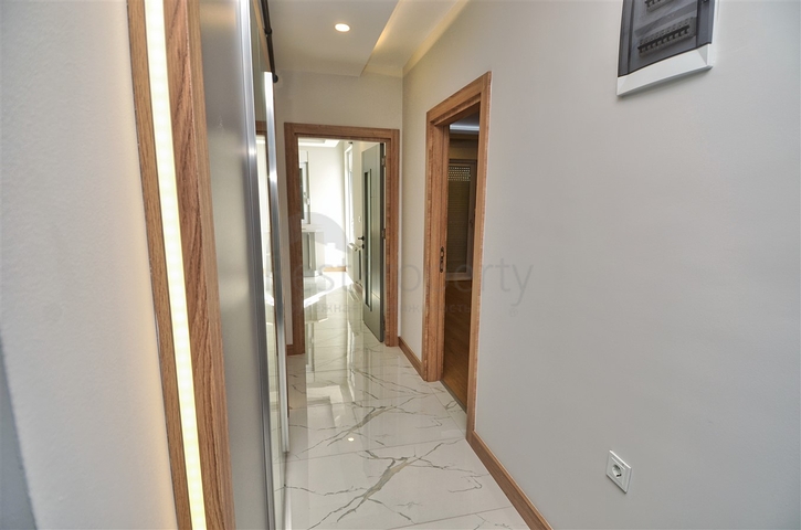 Квартира планировки 2+1  в микрорайоне Кызыларык - Анталия  