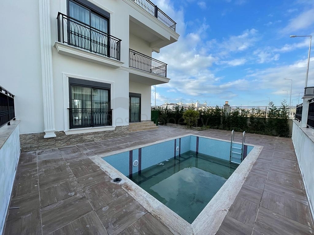 Трехэтажная вилла планировкой 4+1 в районе Белек - Анталия