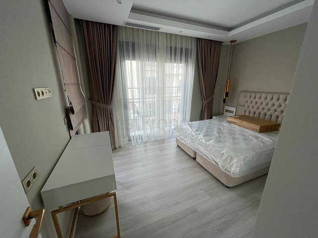 Трехэтажная вилла планировкой 4+1 в районе Белек - Анталия