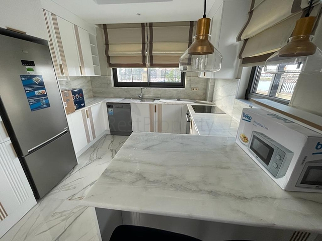 Трехэтажная вилла планировкой 4+1 в районе Белек - Анталия