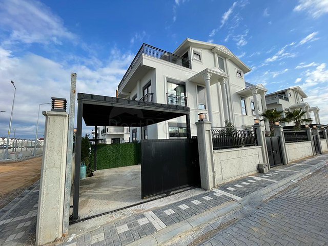 Трехэтажная вилла планировкой 4+1 в районе Белек - Анталия