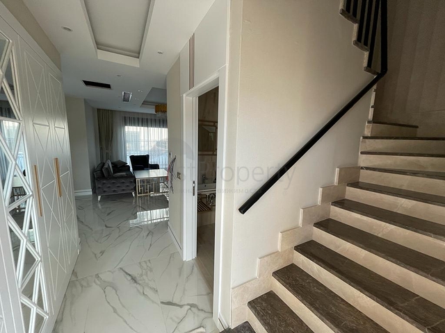 Трехэтажная вилла планировкой 4+1 в районе Белек - Анталия