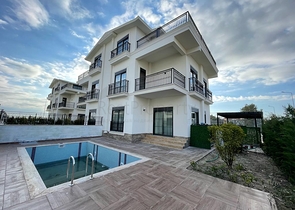 Трехэтажная вилла планировкой 4+1 в районе Белек - Анталия