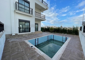 Трехэтажная вилла планировкой 4+1 в районе Белек - Анталия