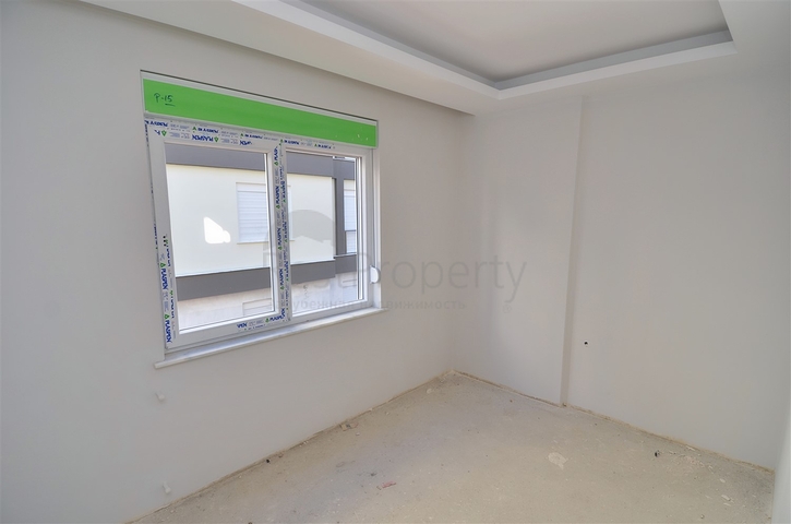 Квартиры планировки 3+1 в микрорайоне Кызыларык - Анталия 