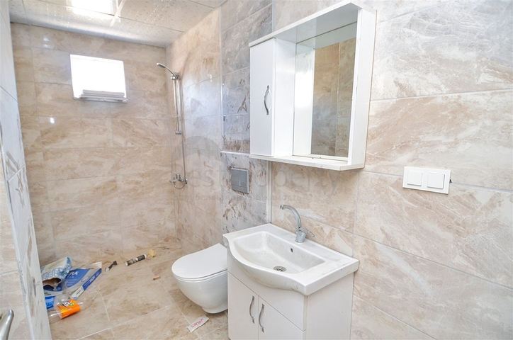 Квартира планировки 2+1 в центре города Анталия 