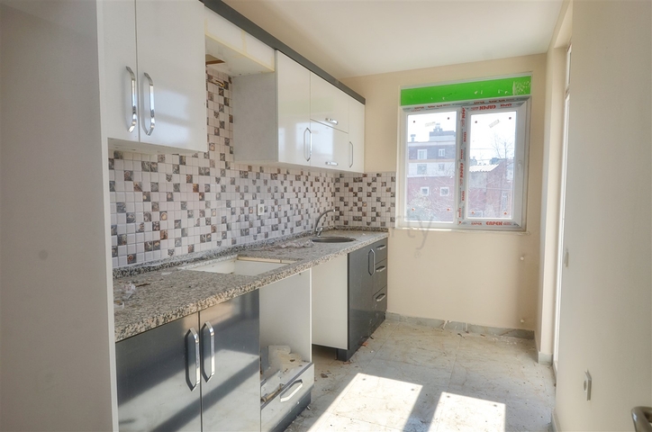 Квартира планировки 2+1 в центре города Анталия 