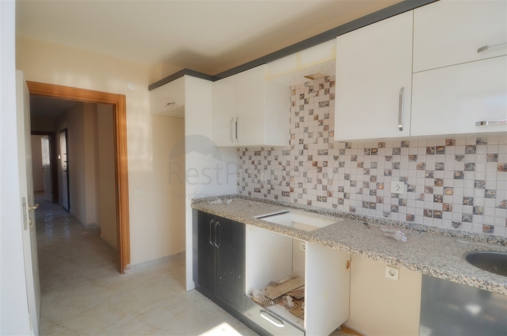 Квартира планировки 2+1 в центре города Анталия 