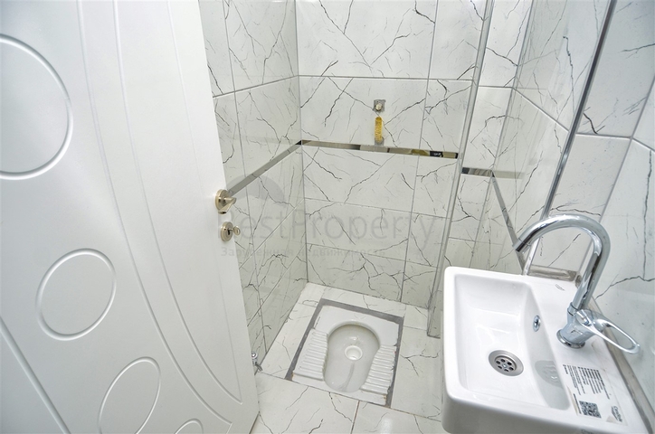 Квартира планировки 2+1 в центре города Анталия 