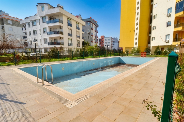 Квартира планировки 2+1 в центре города Анталия 