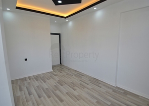 Квартира планировки 2+1 в центре города Анталия 