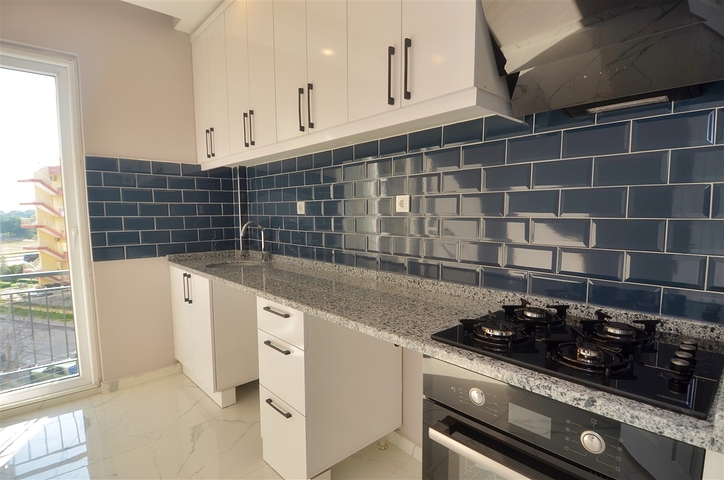 Квартира планировки 2+1 в микрорайоне Гюзельоба - Анталия 