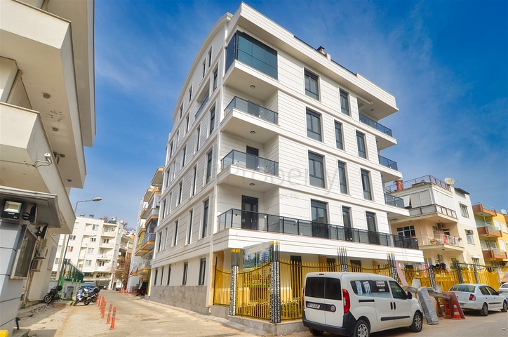 Квартиры планировки 2+1,3+1 в центре города Анталия 