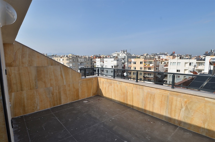 Квартиры планировки 2+1,3+1 в центре города Анталия 