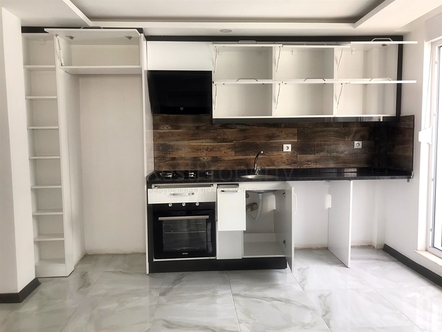 Квартира планировки 1+1 в центре города Анталия 