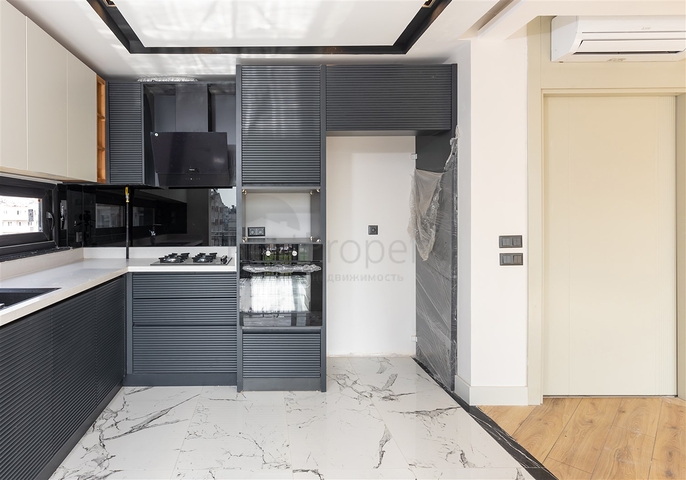 Квартира планировки 2+1 в микрорайоне Шириньялы - Анталия 