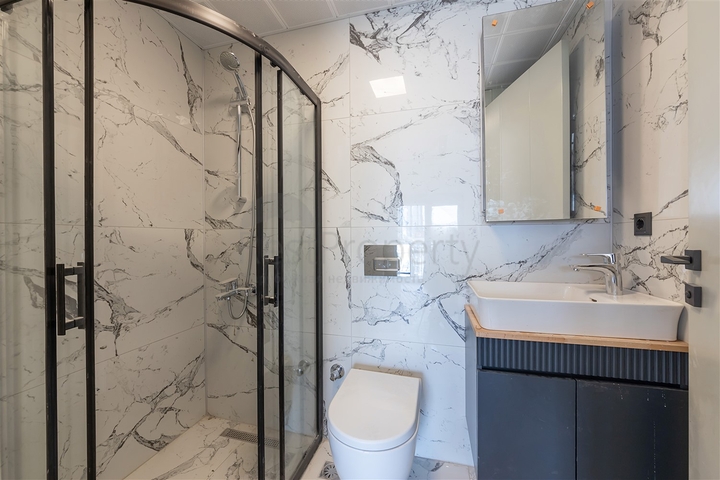 Квартира планировки 2+1 в микрорайоне Шириньялы - Анталия 