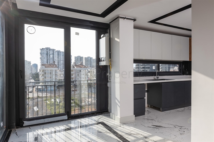 Квартира планировки 2+1 в микрорайоне Шириньялы - Анталия 