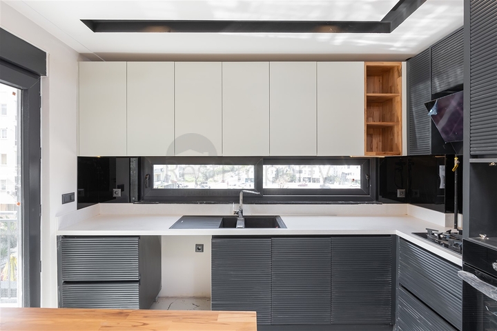 Квартира планировки 2+1 в микрорайоне Шириньялы - Анталия 