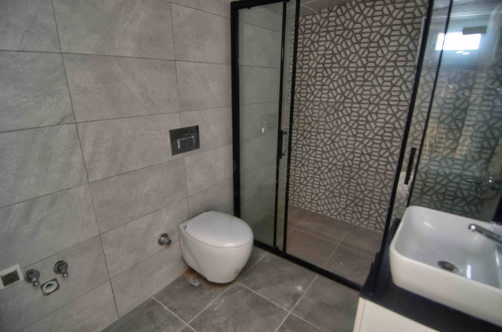 Квартира планировки 3+1 дуплекс в микрорайоне Гюзяльоба - Анталия