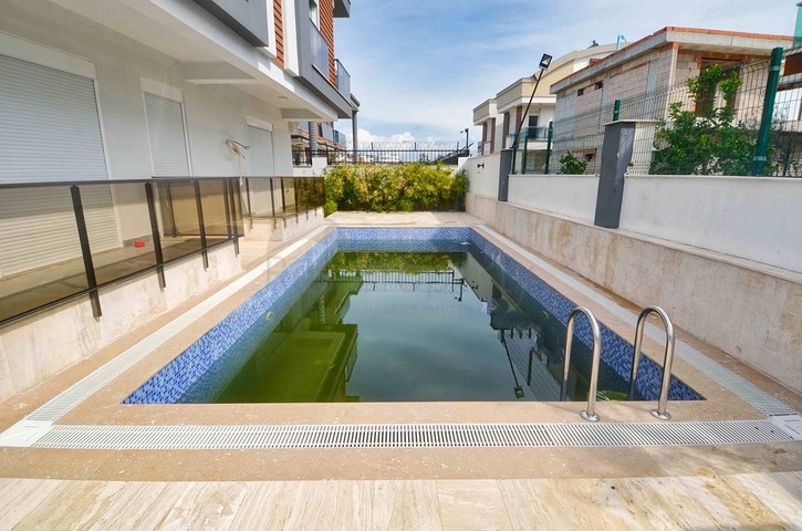 Квартира планировки 3+1 дуплекс в микрорайоне Гюзяльоба - Анталия