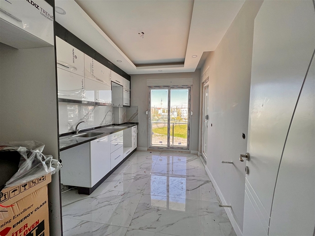 Квартира планировки 4+1 в микрорайоне Конуксявяр - Анталия 