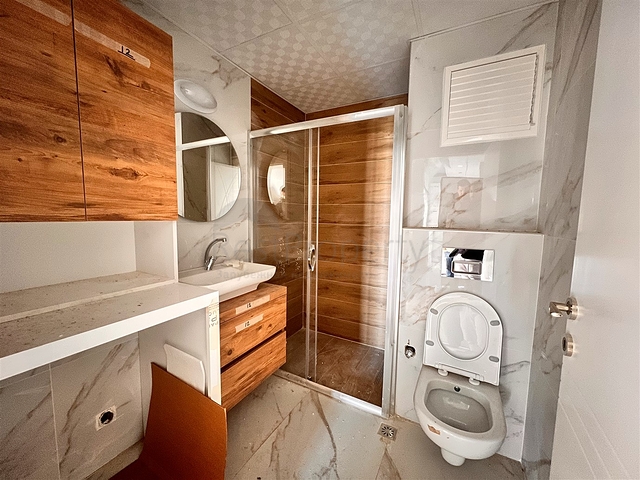 Квартира планировки 4+1 в микрорайоне Конуксявяр - Анталия 