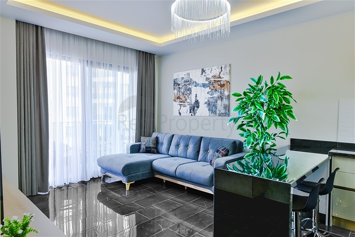 Квартира 1+1 в новом жилом комплексе района Махмутлар