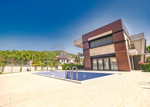 Уютная вилла планировки 4+1 в районе Кемер - Анталия 