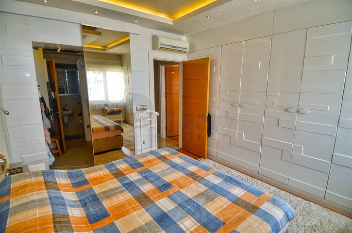 Квартира планировки 3+1 в микрорайоне Мельтем - Анталия 