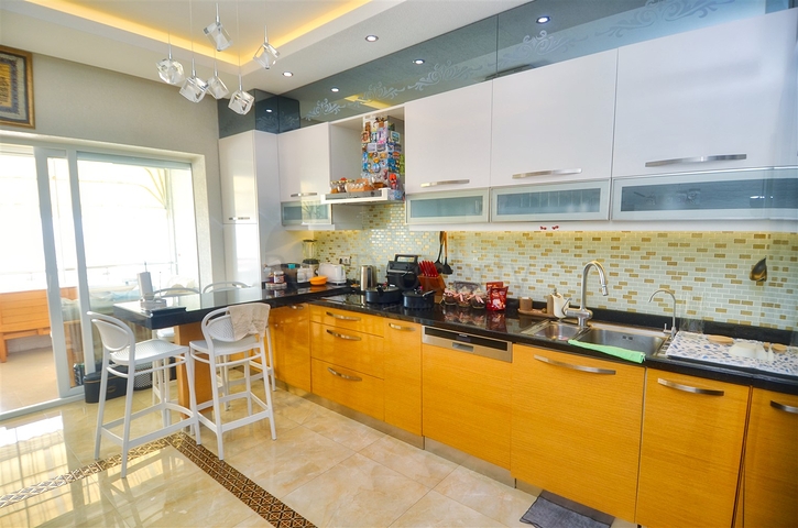 Квартира планировки 3+1 в микрорайоне Мельтем - Анталия 