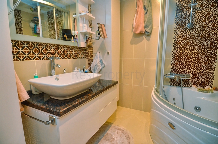 Квартира планировки 3+1 в микрорайоне Мельтем - Анталия 