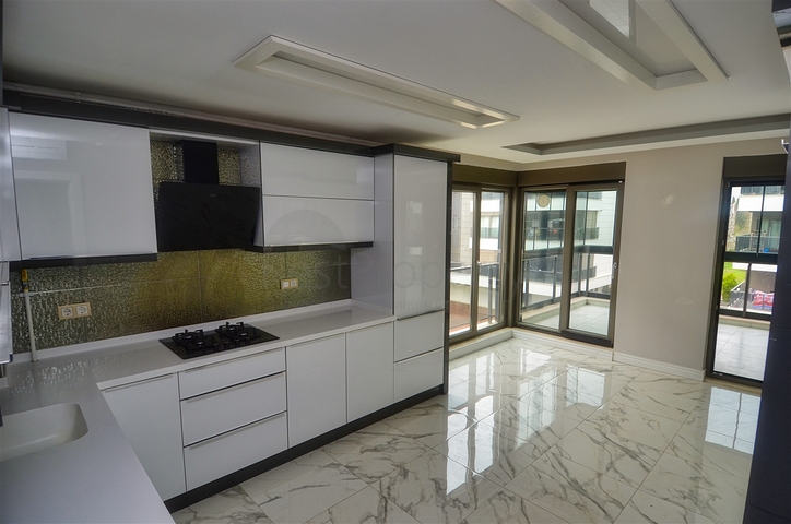 Квартира планировки 3+1 в микрорайоне Унджаллы - Анталия 