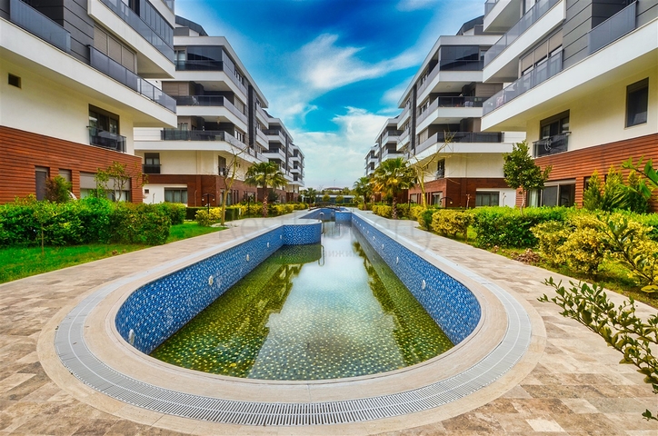 Квартира планировки 3+1 в микрорайоне Унджаллы - Анталия 