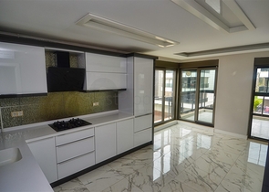 Квартира планировки 3+1 в микрорайоне Унджаллы - Анталия 