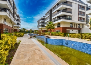 Квартира планировки 3+1 в микрорайоне Унджаллы - Анталия 