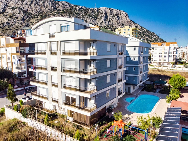 Квартира с придомовым бассейном планировки 2+1 в микрорайоне Хурма - Анталия 