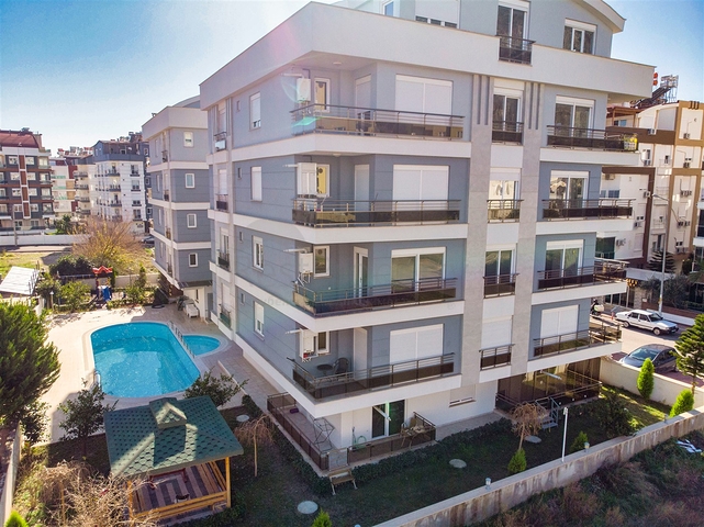 Квартира с придомовым бассейном планировки 2+1 в микрорайоне Хурма - Анталия 