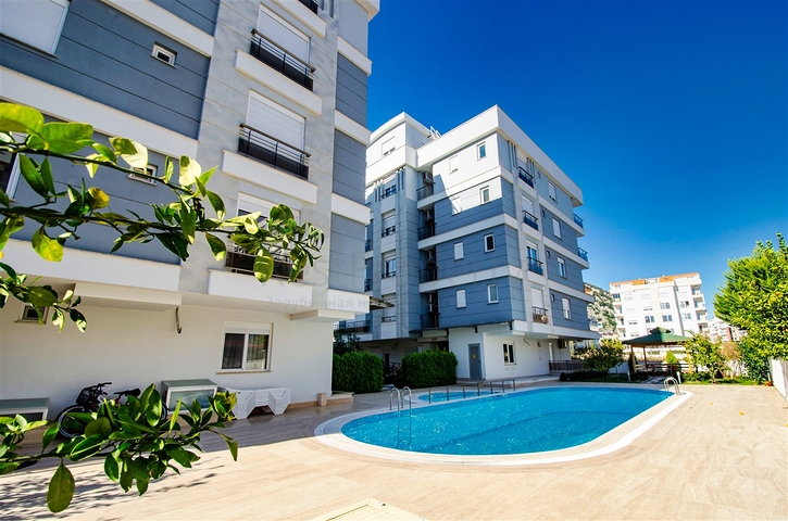 Квартира с придомовым бассейном планировки 2+1 в микрорайоне Хурма - Анталия 