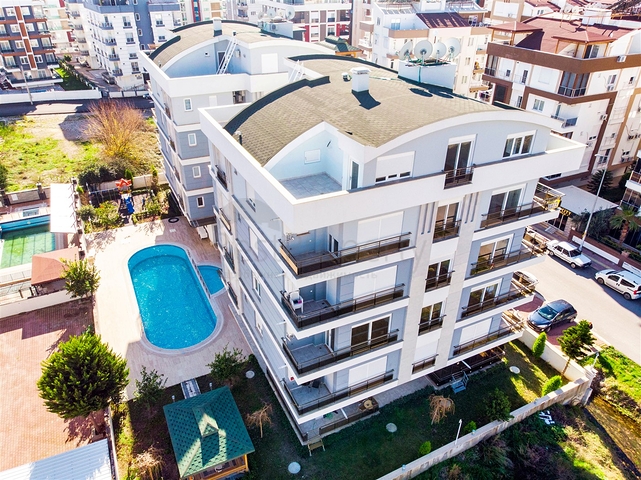 Квартира с придомовым бассейном планировки 2+1 в микрорайоне Хурма - Анталия 