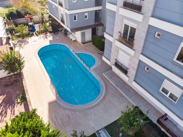 Квартира с придомовым бассейном планировки 2+1 в микрорайоне Хурма - Анталия 